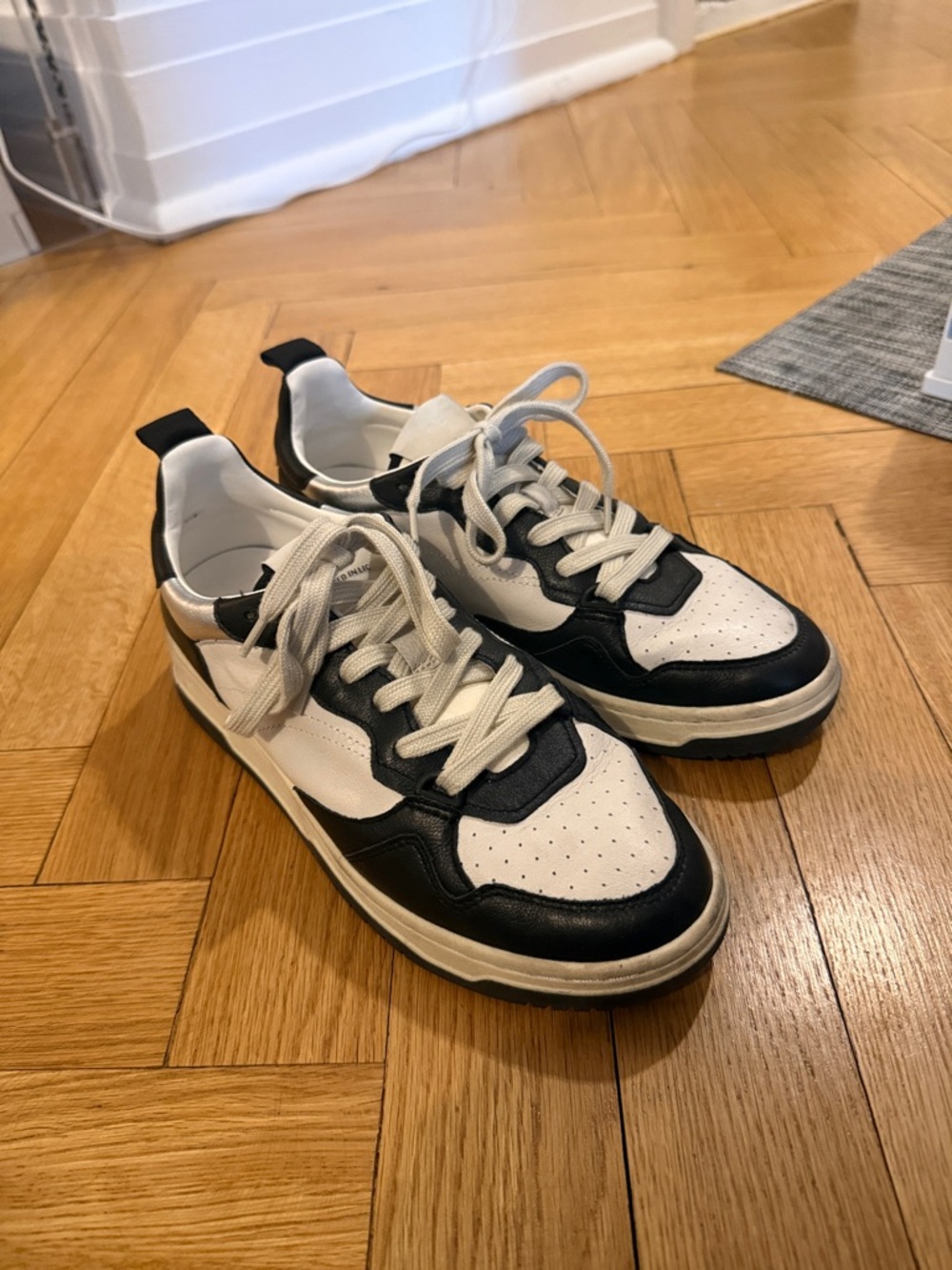 Women’s Black & White Casual Leather Sneakers